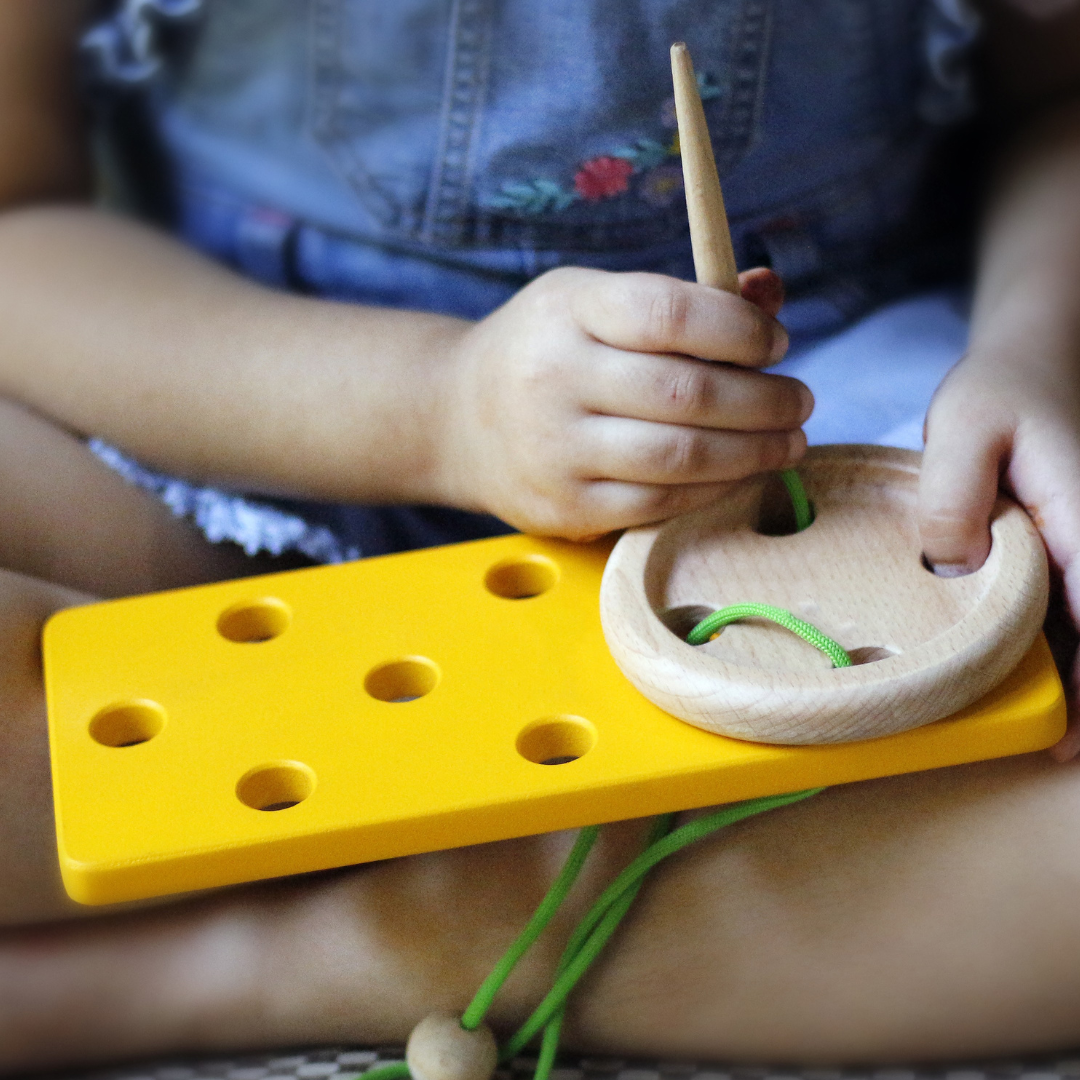 Stitch a button toy