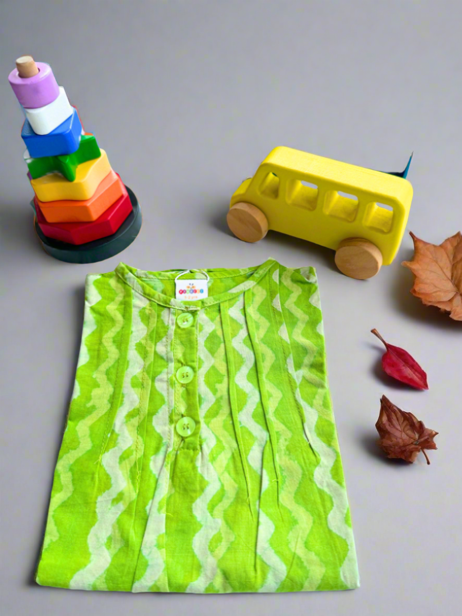 Zigzag green dabu print dress, multi shape stacker and yellow bus combo